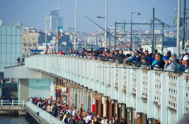 Croweded Galata Bridge between Eminonu and Karakoy in Istanbul